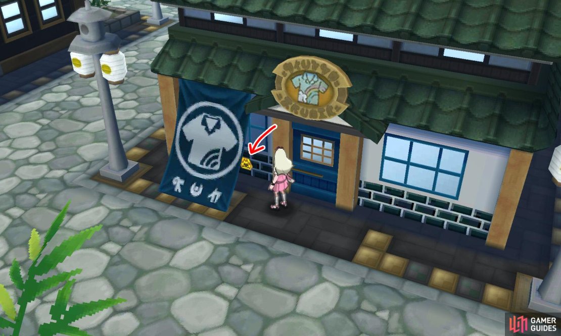 053: Left of the apparel shop entrance.
