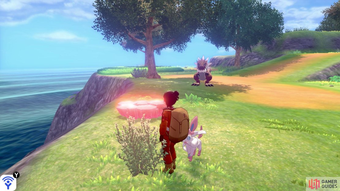 Continue clockwise while sticking to the left. After going past the pathway leading to Dyna Tree Hill, there&rsquo;s a slope that leads to a section of lower ground. Go down the slope and you&rsquo;ll find this den when you turn left.