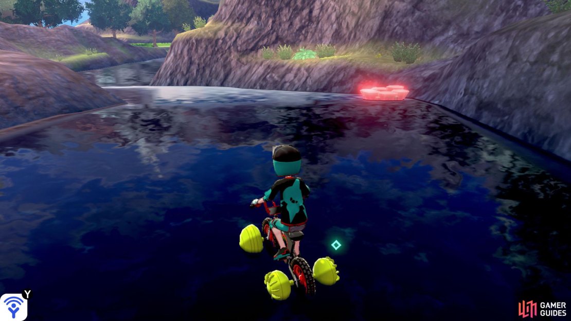 Use the water-traversing bike to enter the river that leads to Ballimere Lake. Go forward for a distance and you&rsquo;ll find this den before turning a corner.