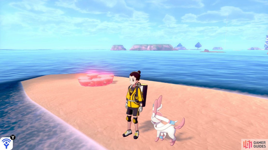 To the right of the string of Pok&eacute;mon Dens (with your back facing the Tower of Waters), there&rsquo;s a long, sandy island. This den is located towards the tip nearest to the tower.