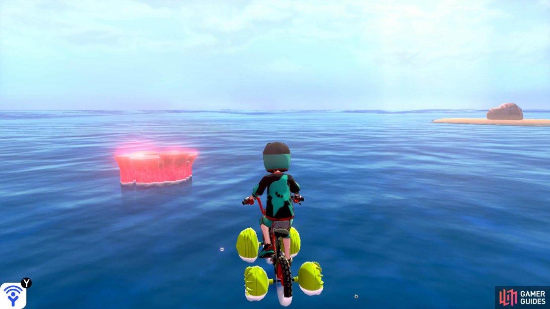Return to the first islet, directly opposite Armor Station. Straight ahead, in the distance, there should be a den that&rsquo;s near an islet with a boulder. That&rsquo;s the den you&rsquo;re looking for. Expect an incoming Sharpedo.