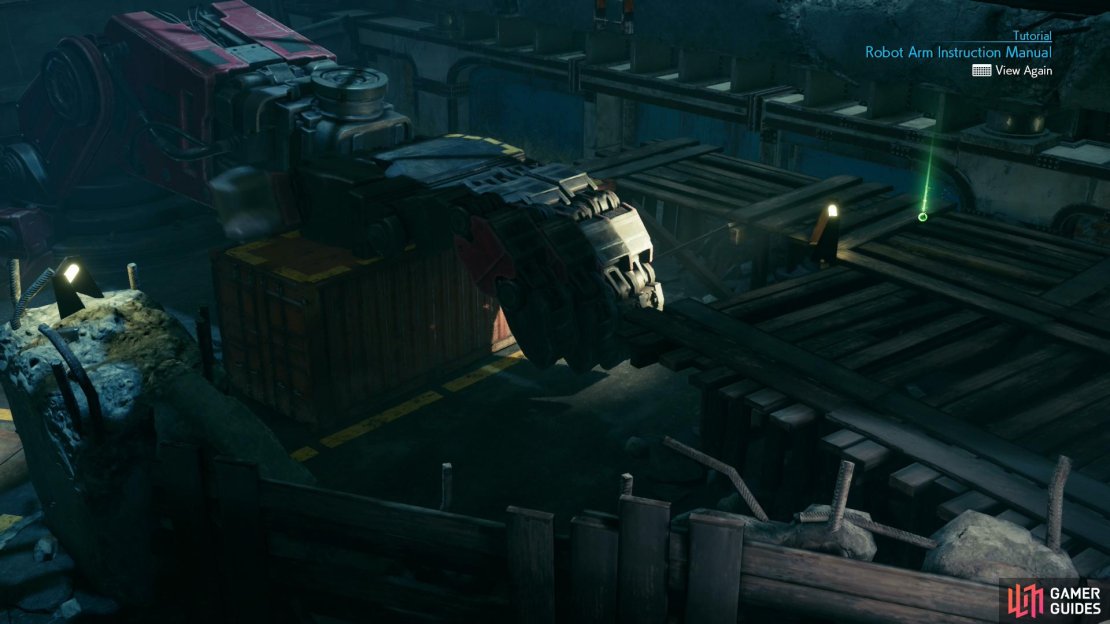Use the mechanical arm to move a shipping container,