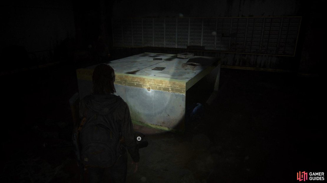 Head into the back room of the Bank and interact with the bag to find an Artefact