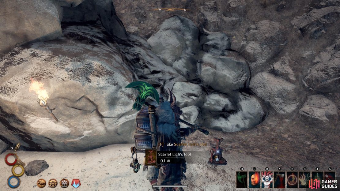 You will find the idol, referred to as Scarlet Lich&rsquo;s Idol, to the right of a corpse in the room accessed with the key from The First Cannibal.