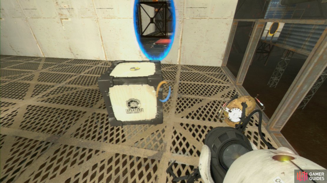Pick up the Wooden Test Cube before dropping down to the platform below, once down here, set a portal on the wall to your left and then zoom in to the wall just to your right (in the distance). Place your next portal here and carry the Cube over to the red square button on the floor. This&rsquo;ll rotate the panel so it&rsquo;s facing upwards.