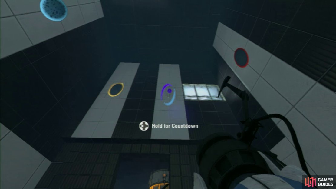 Player 1: Once you enter the room, you should notice the two red buttons up on the wall straight ahead of you. There are also two Arial Faith Plates located on the ground on both the left and right-hand side of the room. Your first task is to plant a portal on the blue &lsquo;target&rsquo; on one of the walls, and then place an exit portal (at the same height) on the wall above the entrance to the room.