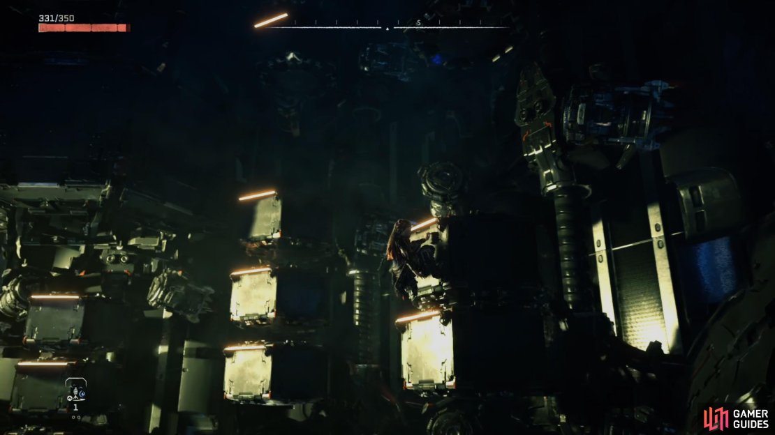 Take the elevating platforms up to the top and then jump across tot he left