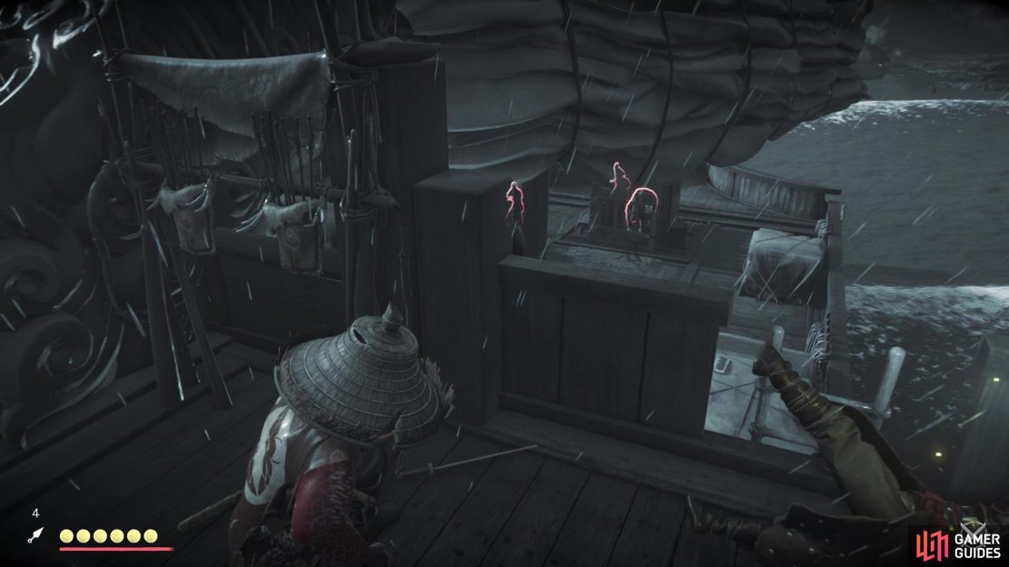 There is a bear being held in a cage