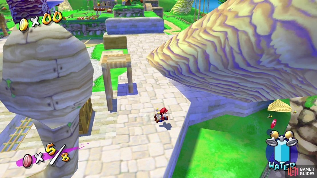 The 6th Red Coin is behind the palm tree to the left of the bath.