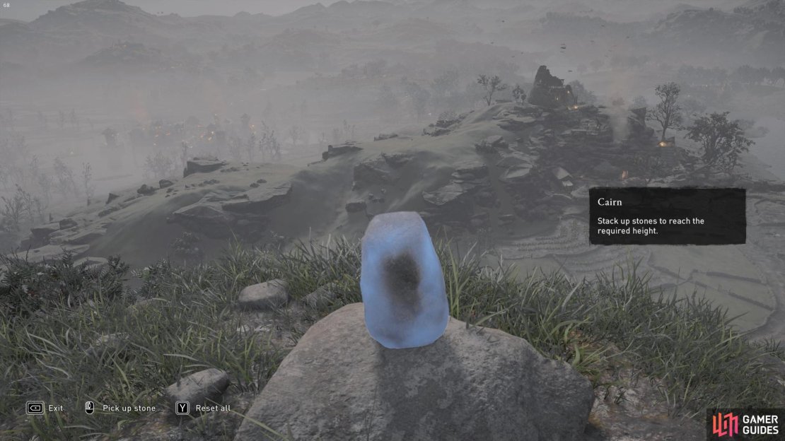 First, take the largest rock and rotate it so that it stands slightly taller.