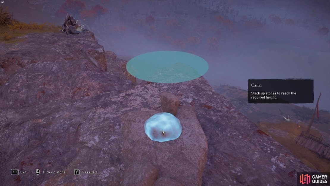 Find the flattest rock to serve as the base for your stack.