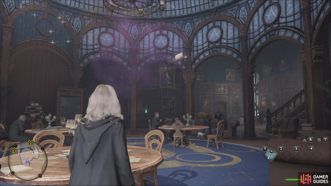 A flying book is inside the blue astronomical study area beside the Charms Floo Flame.