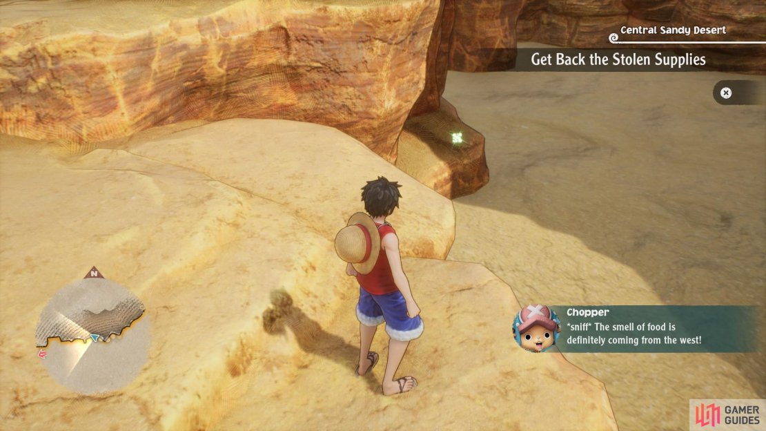 A cube hides near the cliff on the northern boundary in the southern Great Sandy Desert area.
