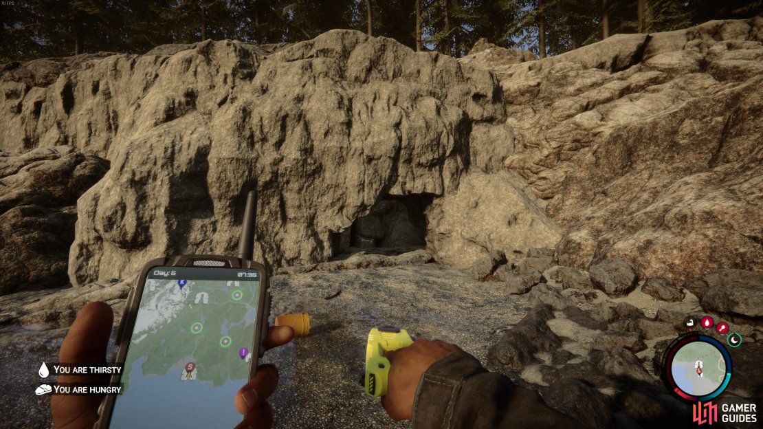 The entrance to the cave where you&rsquo;ll find the Stun Gun, close to an estuary as shown on the map.