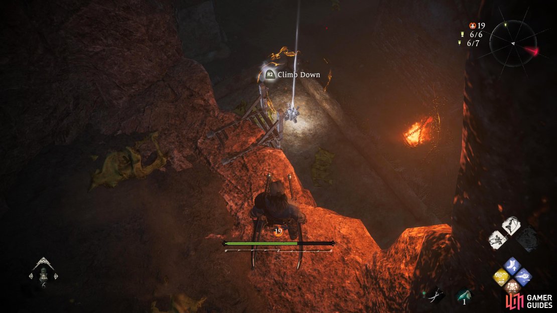 Follow the left building&rsquo;s roof from the ramparts until you find the cave on your right.