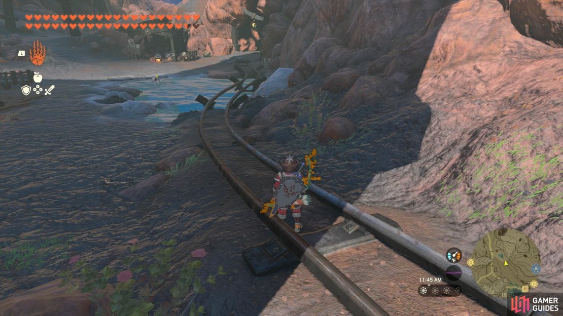 Follow the minecart tracks towards Goron City.