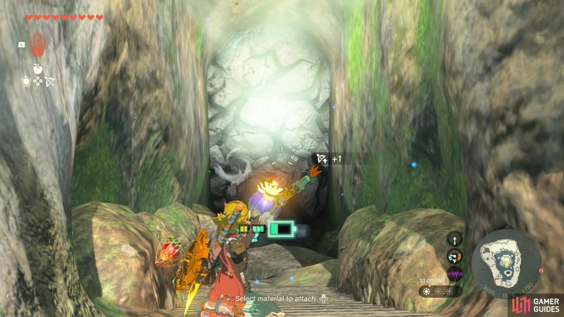 Use a bomb to break open the path to the cave.
