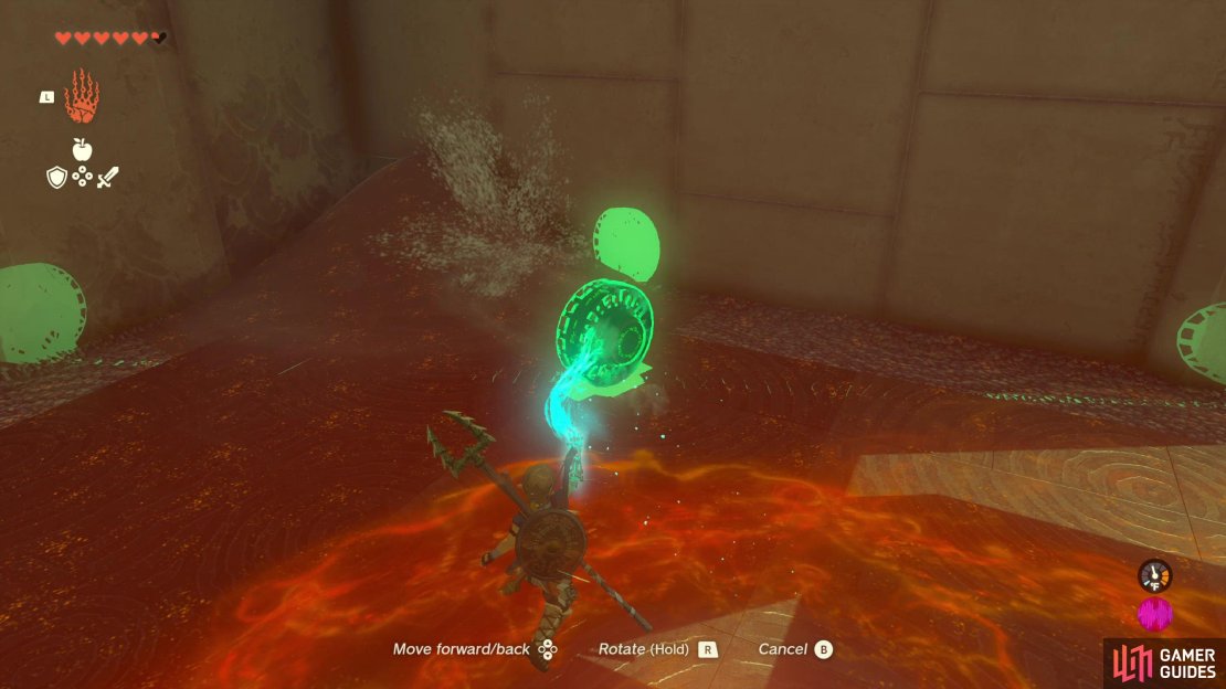 Blow away some sand in the corner of the second chamber to reveal a passage.