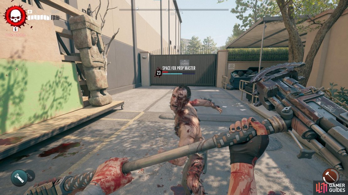 Fight the Prop man and get the key from his corpse.