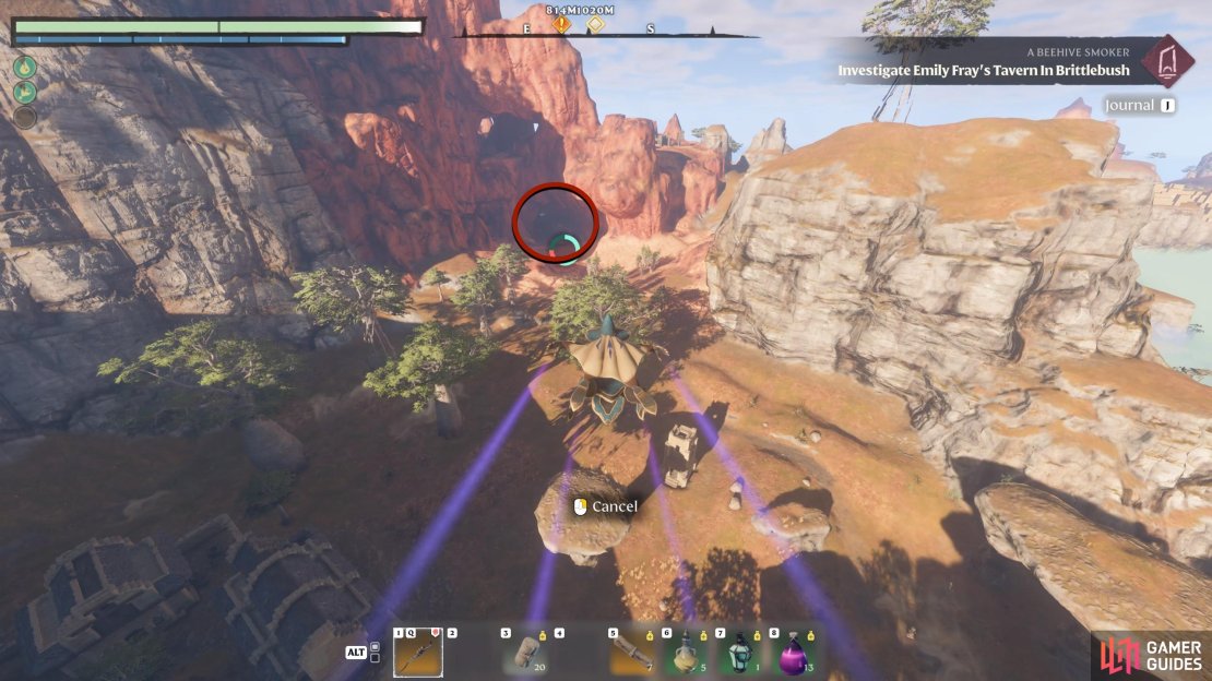 From the Nomad Highland Spire, glide toward the cave in the red mountain.