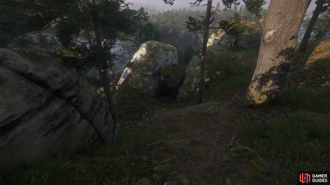 Follow a trail east of the woodcutter&rsquo;s clearing to find a boulder wedged between two rocks,