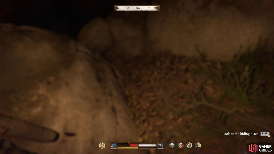 After the short scene continue along the path until you find two large boulders.