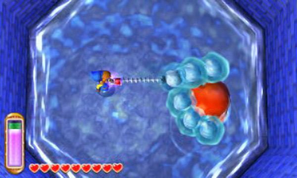 To begin with, the boss will surround itself with small jelly-like eyes. Have your hookshot ready; stand a good distance from the boss and fire the hookshot to pull an eye away and then hack at it. The eyes you hookshot off will try to return to the boss, so it&rsquo;s a good idea to stay distant, leaving them with a longer journey back.