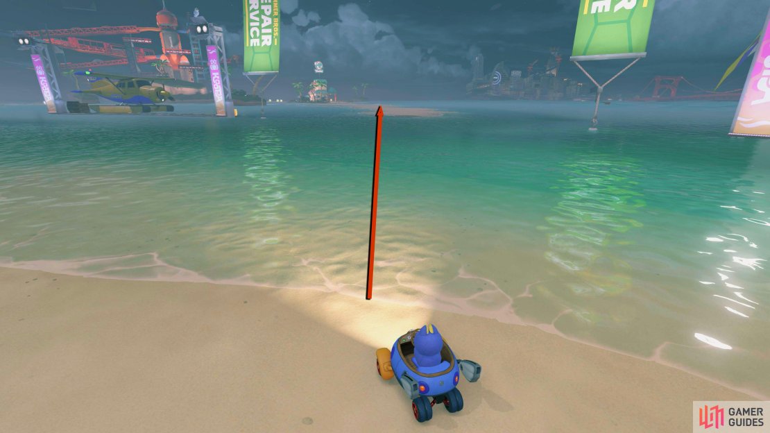 From the starting flag, go west. Drive across the water to the right of the yellow plane to find another track.