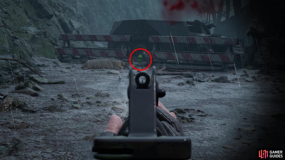 After fighting the Shagohod you&rsquo;ll get another chase sequence. Near the end of this area Eva will drive uphill towards some white and red roadblocks. This Kerotan is on the ground between them.