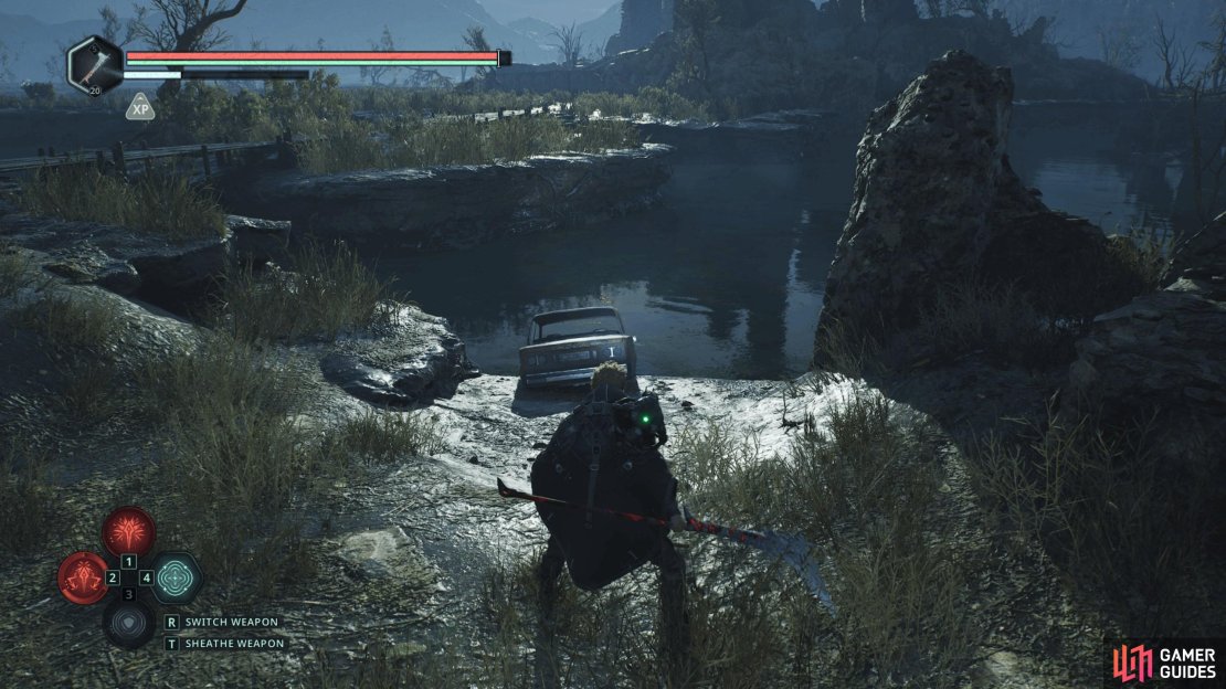 Near the ruins, you&rsquo;ll find a submerged car.