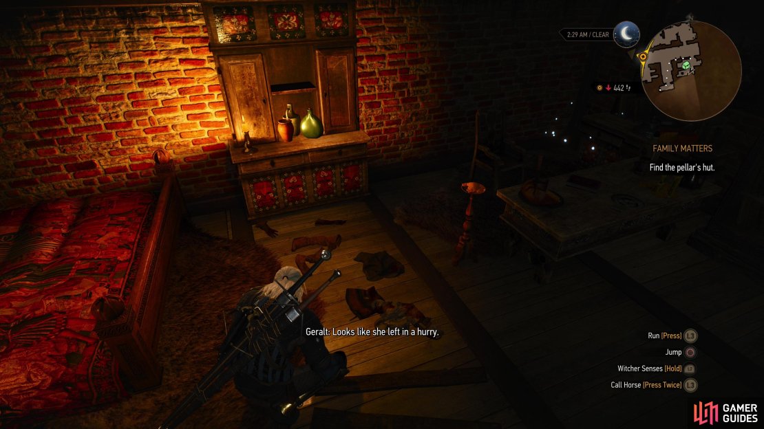 Search the clothes strewn across the floor,