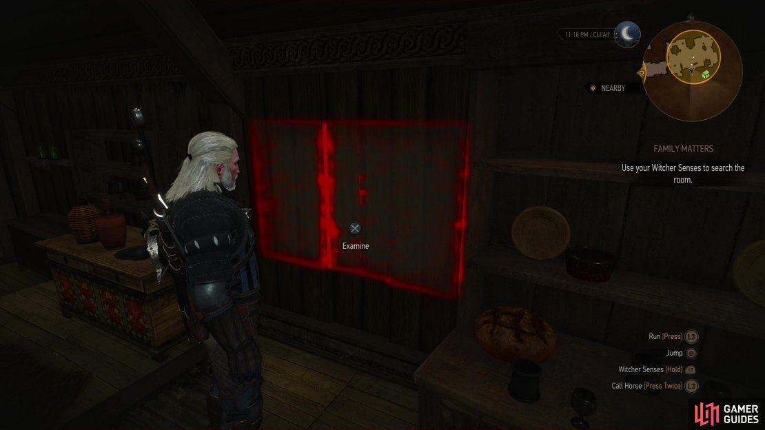 Examine a discolored spot on the wall,