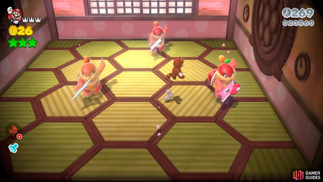 The real Pom Pom will have a colored shuriken, as well as a green ribbon