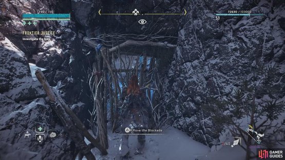 Find the blockade at the back between the rocks