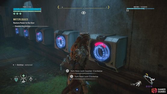 Replace the emitter to the holo-lock to unlock the door