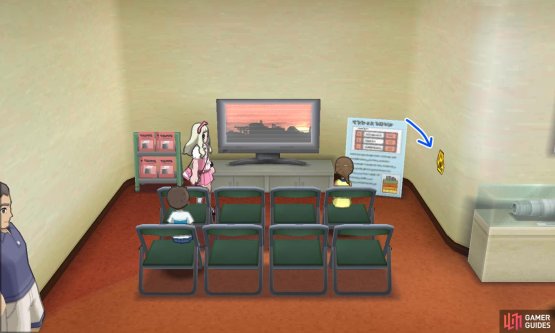 065: Inside the building on a wall to the right of the TV.