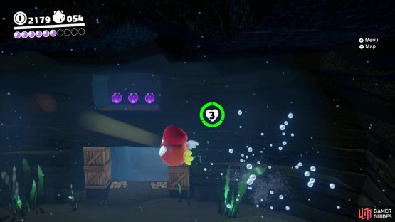 After breaking the boxes, look behind you and above the boxes for some purple coins