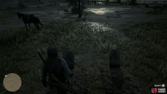 you&rsquo;ll find two graves to examine to the west of the main path.