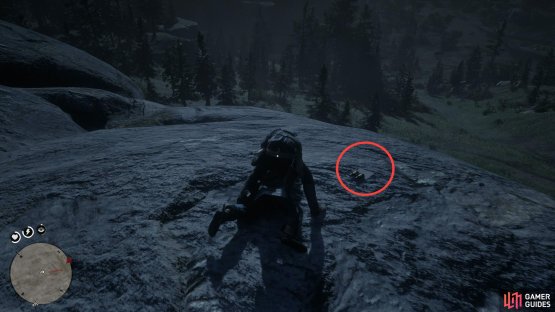the map can be found on the ground next to him.