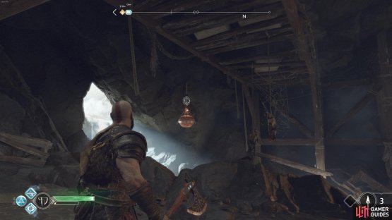 Toss the axe at the disc to drop the fire pot on enemies below when they spawn.