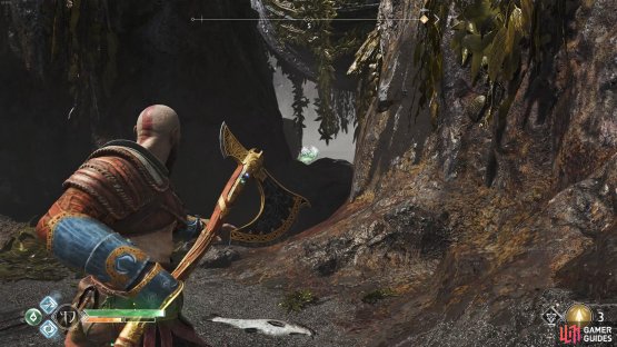 This Raven is hiding between the two platforms in front of the coffin.