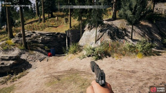 The first stash is found in a small bunker just outside the cabin