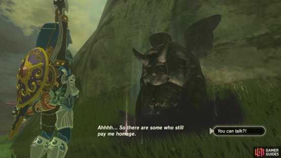 This is the statue in question. It looks like a horned devil