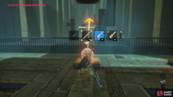 then switch to a one-handed weapon and give it one hit with it to get it to perfectly land in the goal.