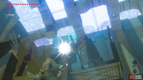 Shoot the wooden platform down to reveal a large metal cube
