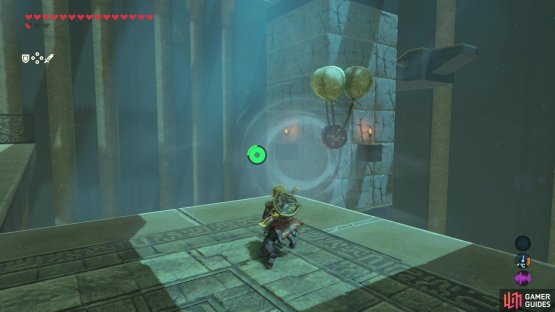 Use your korok leaf to guide the barrel into the large column of explodable rock cubes