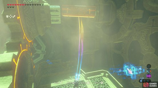 Place the metal block inside the alcove opposite the cog