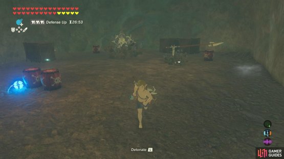 Place a bomb near the bomb barrels, then run in the camp to awaken the Lizalfos.