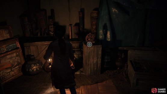 Inspect objects in the game with the use of the triangle button