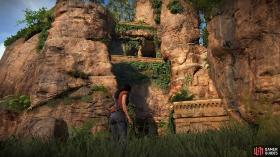 Climb the cliffs to reach the upper platform